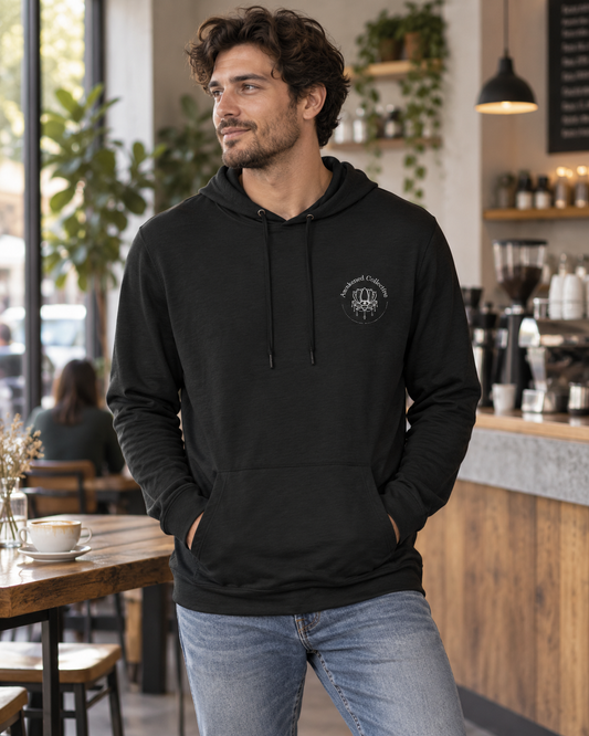 Awakened Collection lightweight hoodie in black – lifestyle hero