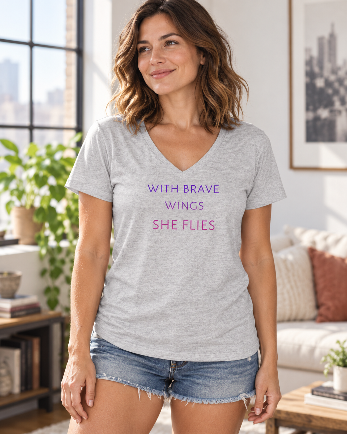With Brave Wings women's V-neck tee in light heather grey – lifestyle hero